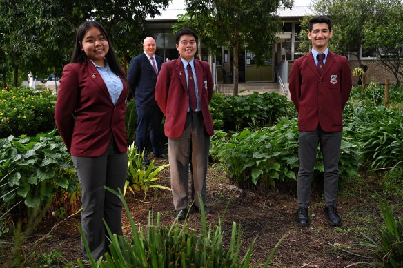 Cabramatta High School captains
Jennifer Luu, Dawson Phan, and school ambassador Steven Asman,  with principal Lachlan Erskine.