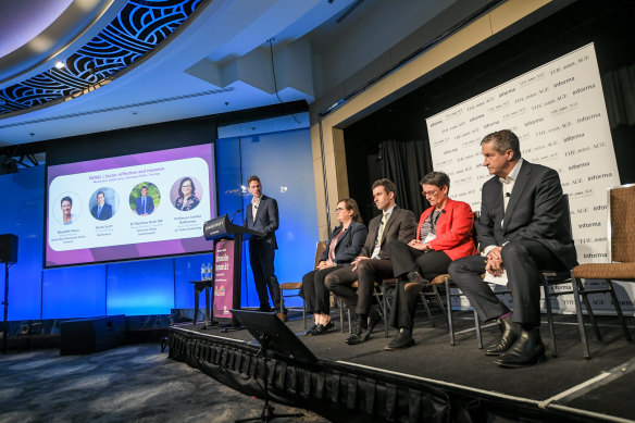 Education reporter Adam Carey moderating a panel discussion at The Age Schools Summit on Thursday.