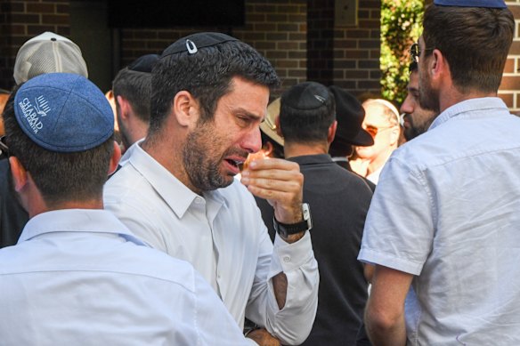 Mourners at the funeral for Yaakov Levitan Halevi at Macquarie Park.