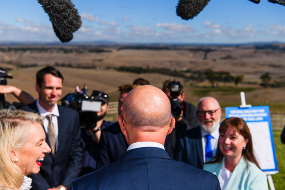 Outstanding in his field: Dutton  announced airport funding at the Marnong Estate Winery. 