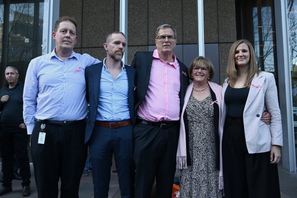 Lynette’s nephew David Jenkins (left) with family after the verdict including Lynette’s brother Greg Simms (centre).