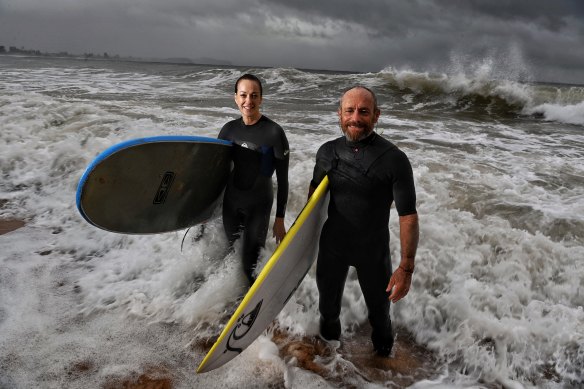 Independent candidate for Mackellar Sophie Scamps and surfing legend Tom Carroll at Collaroy Beach.