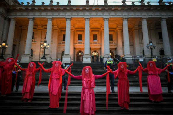Extinction Rebellion protesters outside Parliament House in Melbourne on Monday.