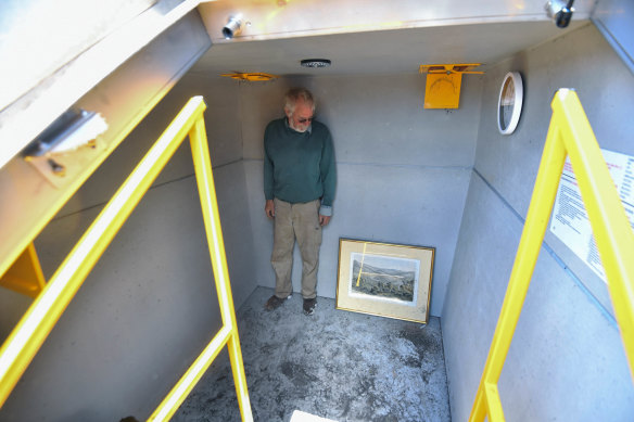 Donald Graham in his bunker with the lithograph. 