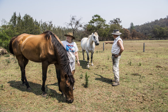 Fran and John Sanders are grateful their property escaped the fires that claimed others along their road near Moruya.