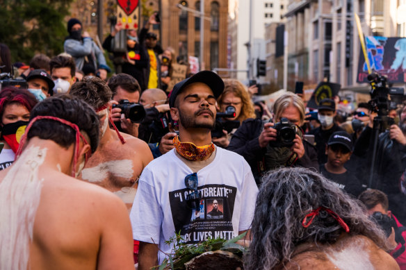 A moment of sombre reflection during a Black Lives Matter march.