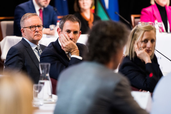 Anthony Albanese, Treasurer Jim Chalmers and Finance Minister Katy Gallagher listen to a speaker on the opening day of the jobs summit.