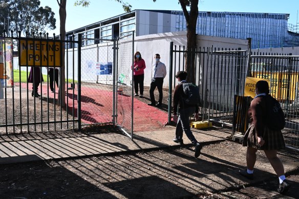 Students return to school  at Fairvale High School, in Fairfield West, on Monday.