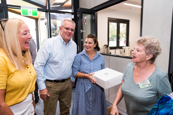 Scott and Jenny Morrison visit the Palmerston 50+ Tuesday Club at the Gray Community Hall in Darwin on Tuesday.