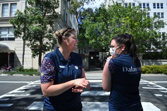 St Vincent’s Hospital’s Eliza Attwood, right, and Rachel Macfarlane, left, (left) after receiving their COVID-19 vaccination on Monday. 