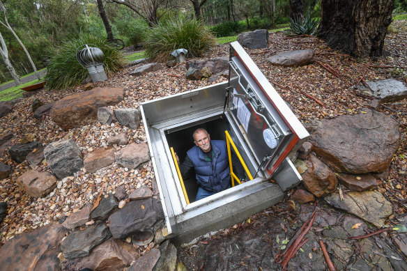 Drew Gordon in his fire bunker in North Warrandyte on Melbourne's forested fringe. Different rules apply in different states for such shelters.