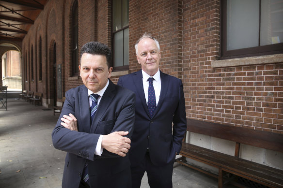 Former senator Nick Xenophon (left) and his former law firm partner Mark Davis.