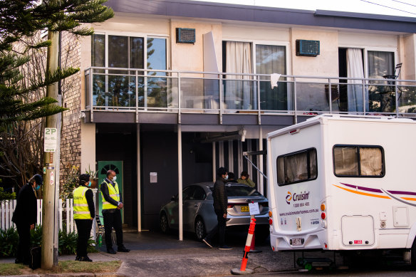 Security guards wearing masks were spotted at the property on Tuesday.