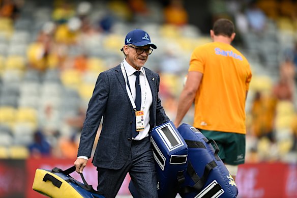 Wallabies coach Les Kiss with some tackle bags.