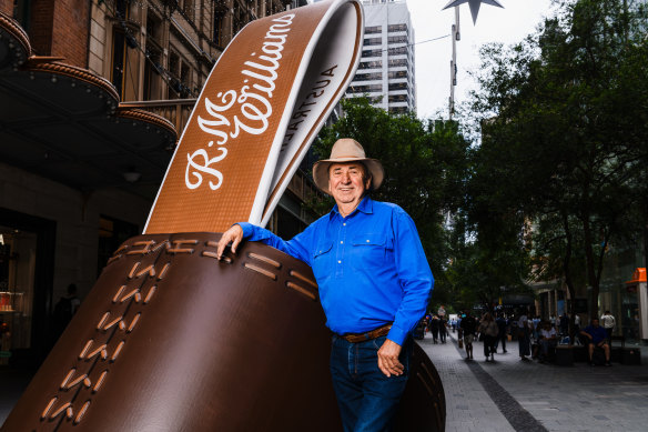 Terry Goodear is in charge of heritage and heartland marketing at R.M. Williams. He poses with pop-up boot in Pitt Street mall, celebrating the upcoming opening of the George Street flagship.