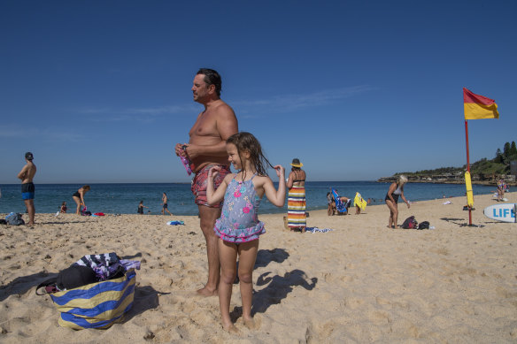 Steve Gregory with his daughter Annabelle at Coogee Beach.