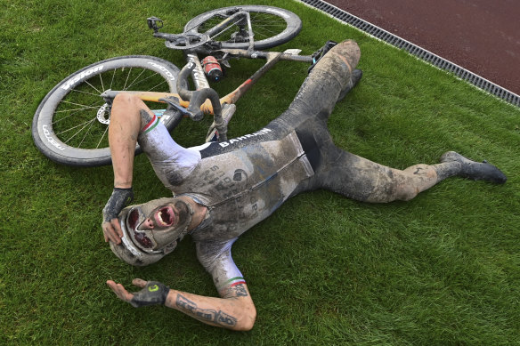 Sonny Colbrelli sobs after winning the rain-soaked 118th edition of Paris-Roubaix in northern France. 