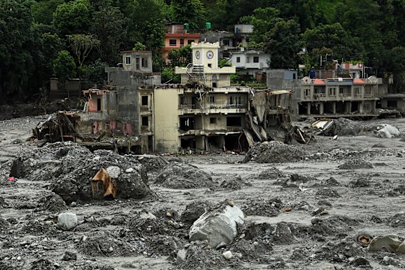 The market town of Betrawoti has been swallowed up by a deluge of mud.  Many of its buildings have been destroyed. 