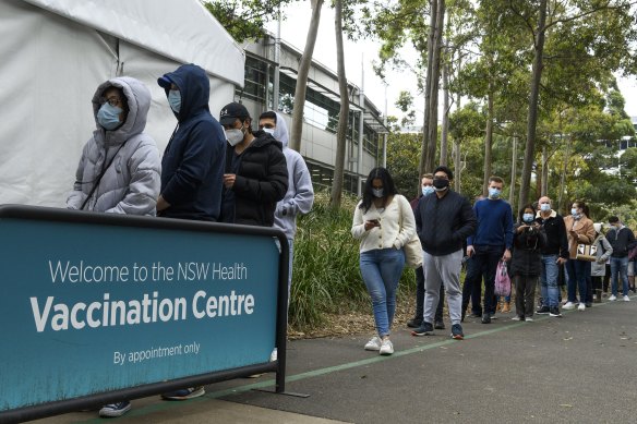 Long lines outside the COVID-19 vaccination centre at Olympic Park on Saturday.