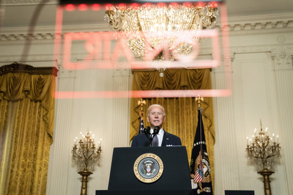 US President Joe Biden speaks while addressing the virtual Munich Security Conference from the White House in Washington.