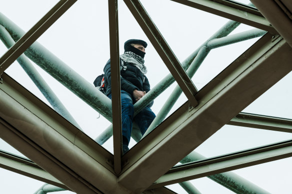 Protesters scaled the balcony of Parliament House.