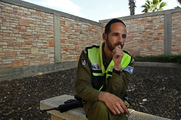 Search and rescue volunteer Israel Revach at the Ofakim cemetery recounts how he helped identify bodies killed in the Hamas attack. 