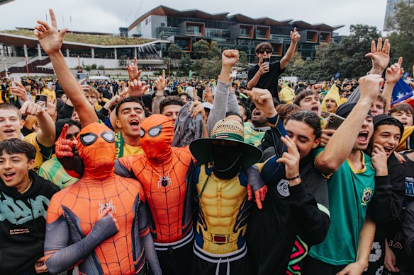 Fans piled into Tumbalong Park despite the rain and the midday kick-off.