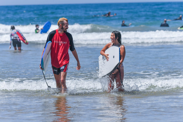 Jordan Forbes and Brooke McKenzie emerge from the water. 