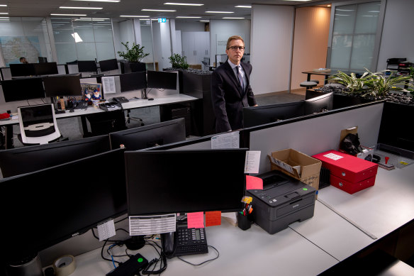 Matthew Kandelaars surveys an empty office.