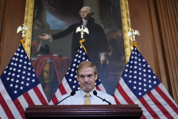 Jim Jordan, staunch ally of Donald Trump, meets with reporters about his struggle to become speaker of the House, at the Capitol in Washington.