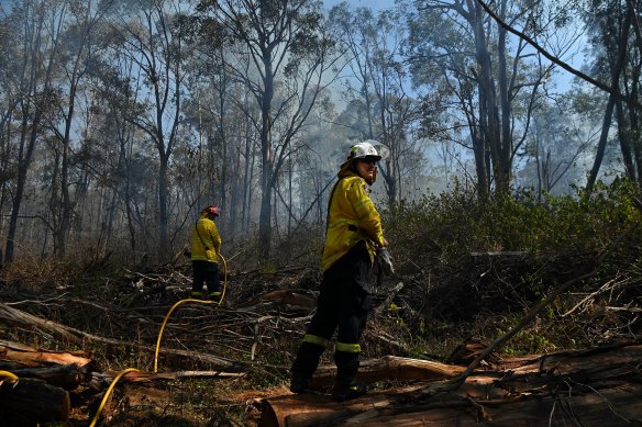 NSW Rural Fire Service controlling a bush fire from a property on Silverdale Road in Wallacia.