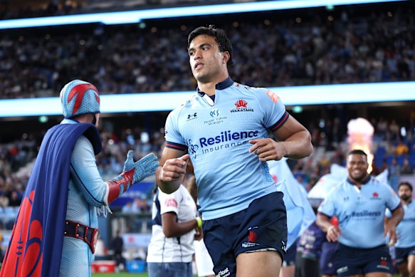 Waratahs star Joseph Aukuso-Suaalii takes the field.