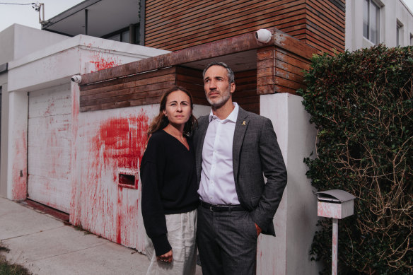 Alex Ryvchin, co-chief executive of the Executive Council of Australian Jewry, with his wife Vicky outside the home in Dover Heights where they lived with their children until 2022.