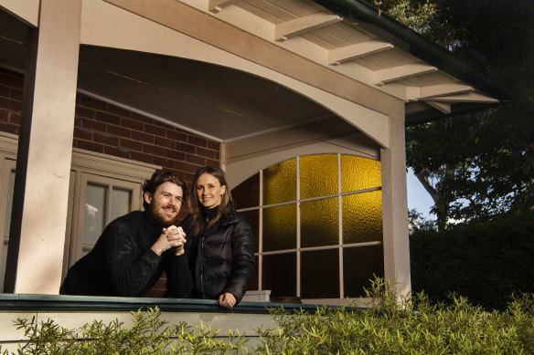 Luisa Low and Richard Moore have both kept their jobs and find they are saving money because of lack of opportunity to spend it.