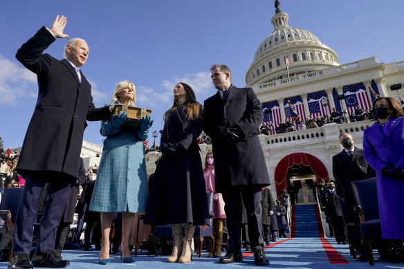 Joe Biden is sworn in as president on January 20, 2021, as wife Jill, daughter Ashley and Hunter watch.