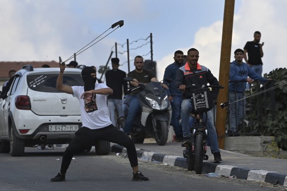 Palestinian youth during clashes with the Israeli military at the City End Circle near the Jalazone refugee camp in al-Bireh, Ramallah, West Bank.