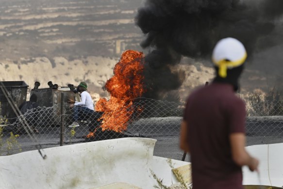 Palestinian youth during clashes with the Israeli military at the City End Circle near the al Jalazone refugee camp in al Bireh, Ramallah, West Bank.