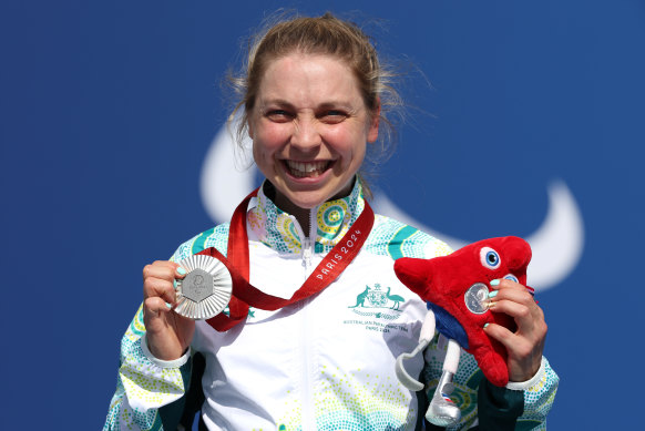 Meg Lemon shows off her silver medal.