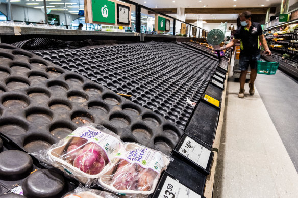 Empty fresh produce shelves at Woolworths in Sydney’s Neutral Bay on Friday.