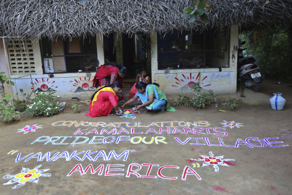 Women in the Indian village of Thulasendrapuram – the home town of Kamala Harris's maternal grandfather –  prepare a Kolam, a traditional art work using coloured powder, to congratulate the new US Vice-President-elect.