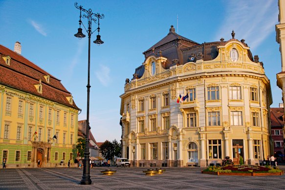 The historic centre of Sibiu is a perfect setting for al fresco pizza and wine.