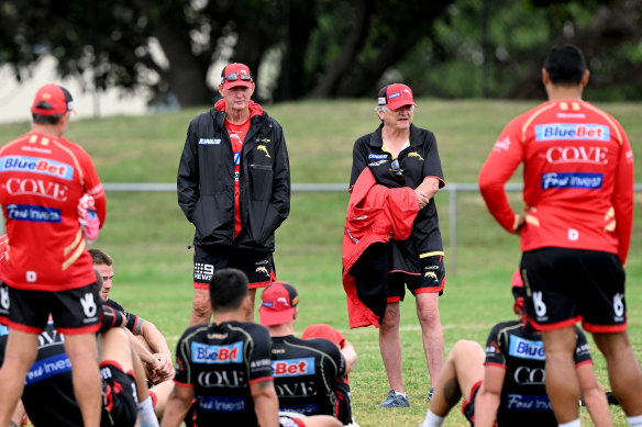 Sports psychologist Dr Phil Jauncey, right, addressing the Dolphins squad alongside coach Wayne Bennett in a training session at Kayo Stadium in Brisbane.