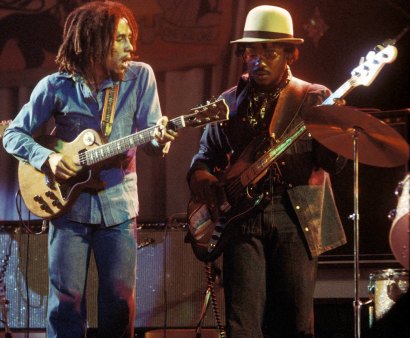 Bob Marley performing live with Aston “Family Man” Barrett, 1975.