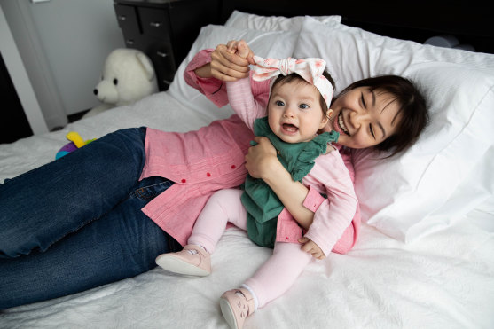 Audrey Ku and her eight-month-old daughter, Madeleine, who was conceived using IVF.