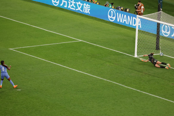 France’s Grace Geyoro scores during the penalty shootout.