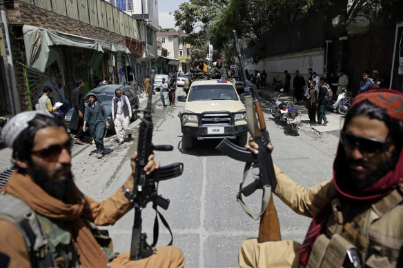 Taliban fighters patrol Kabul this month after reclaiming control of the capital.