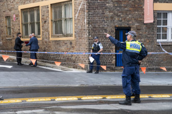 Police at the crime scene outside Essenza Italian restaurant in Surry Hills.