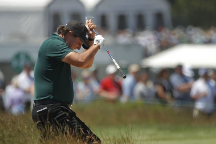 Course management: Phil Mickelson  blows up after a shot from the fescue  during the third round of the US Open..