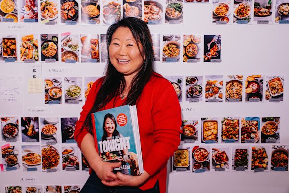 Nagi Maehashi holding her second cookbook. 
