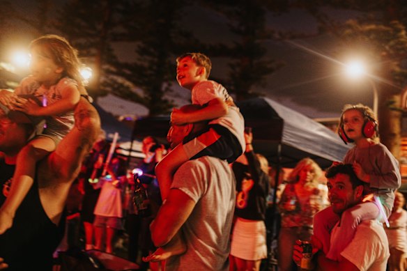 Spectators at Manly watch the local 9pm fireworks.